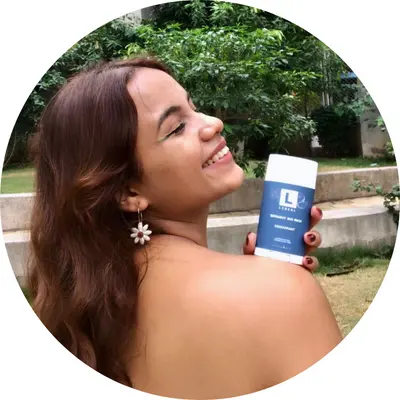 A Girl holding lineal BM deodorant