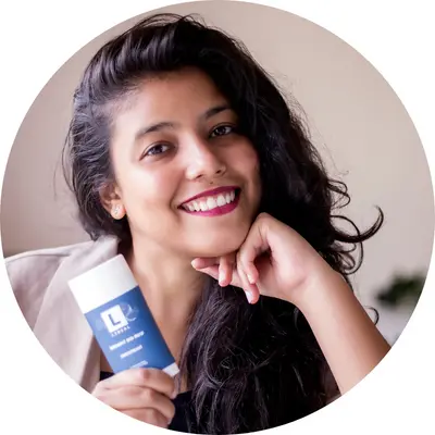 A Girl holding lineal BM deodorant