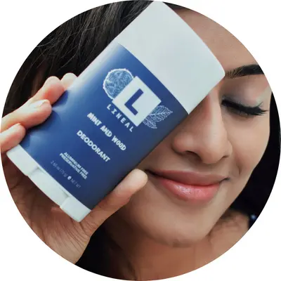 A Girl holding lineal MW deodorant