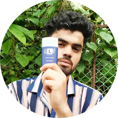 A boy holding lineal MW deodorant