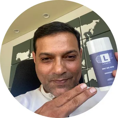 A boy holding lineal MW deodorant