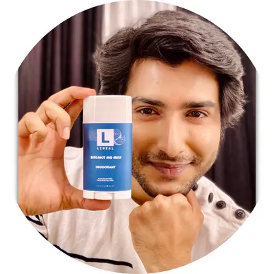 A Boy holding lineal BM deodorant