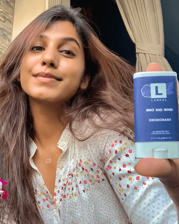A Girl Holding Lineal BM Deodorant